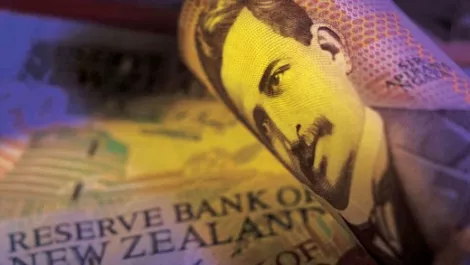 NZ dollar gains vs. Australian dollar on iron ore weakness; Yellen awaited